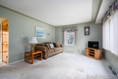 Charming 3-bedroom, 2-bath ranch-style home with full basement on L.E. Kaufman Golf Course in Michigan - for sale on GolfHomes.com, golf home, golf lot