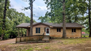 This updated home sits only a few blocks from Crown Lake Pier on The Course At Turkey Mountain in Arkansas - for sale on GolfHomes.com, golf home, golf lot