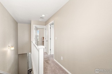 Immaculate home, built in 2017, in the highly sought-after Water on Pelican Lakes Golf and Country Club in Colorado - for sale on GolfHomes.com, golf home, golf lot