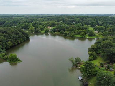 Discover the perfect blend of natural beauty and community on Lost Nation Golf Club in Illinois - for sale on GolfHomes.com, golf home, golf lot