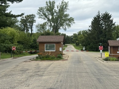 Discover the perfect blend of natural beauty and community on Lost Nation Golf Club in Illinois - for sale on GolfHomes.com, golf home, golf lot