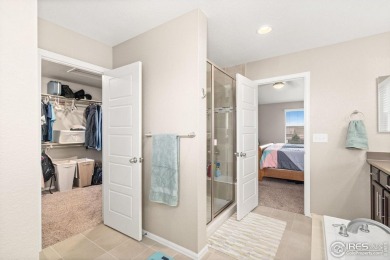 Immaculate home, built in 2017, in the highly sought-after Water on Pelican Lakes Golf and Country Club in Colorado - for sale on GolfHomes.com, golf home, golf lot