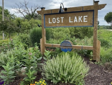 Discover the perfect blend of natural beauty and community on Lost Nation Golf Club in Illinois - for sale on GolfHomes.com, golf home, golf lot