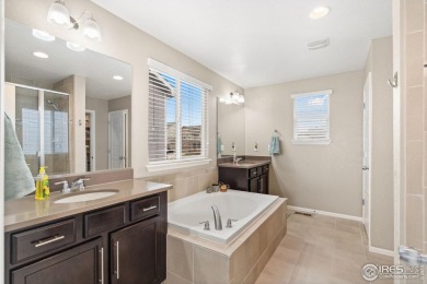 Immaculate home, built in 2017, in the highly sought-after Water on Pelican Lakes Golf and Country Club in Colorado - for sale on GolfHomes.com, golf home, golf lot