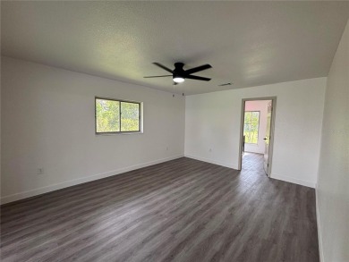 Welcome to your dream retreat in beautiful Lake Estates, FL! on Indian Lake Estates Golf and Country Club in Florida - for sale on GolfHomes.com, golf home, golf lot