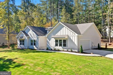 Discover this stunning new construction masterpiece in on Fairfield Plantation Golf and Country Club in Georgia - for sale on GolfHomes.com, golf home, golf lot