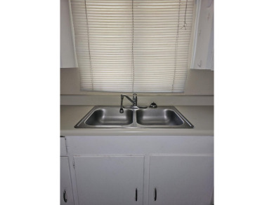 So much potential in this 2 bedroom, 1 bath home.  Roof was new on The Creek Golf Club in South Carolina - for sale on GolfHomes.com, golf home, golf lot