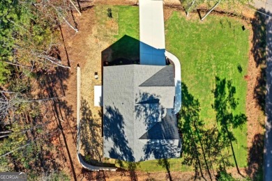 Discover this stunning new construction masterpiece in on Fairfield Plantation Golf and Country Club in Georgia - for sale on GolfHomes.com, golf home, golf lot