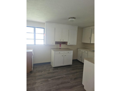 So much potential in this 2 bedroom, 1 bath home.  Roof was new on The Creek Golf Club in South Carolina - for sale on GolfHomes.com, golf home, golf lot