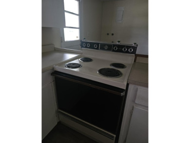 So much potential in this 2 bedroom, 1 bath home.  Roof was new on The Creek Golf Club in South Carolina - for sale on GolfHomes.com, golf home, golf lot