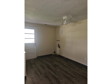 So much potential in this 2 bedroom, 1 bath home.  Roof was new on The Creek Golf Club in South Carolina - for sale on GolfHomes.com, golf home, golf lot