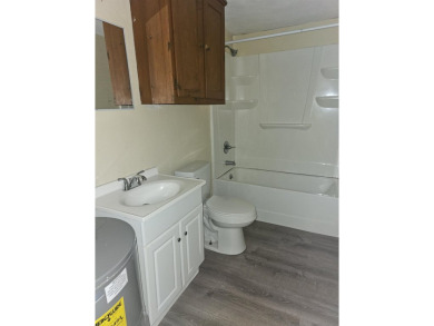 So much potential in this 2 bedroom, 1 bath home.  Roof was new on The Creek Golf Club in South Carolina - for sale on GolfHomes.com, golf home, golf lot