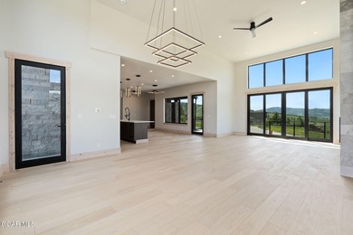 Situated amongst the serene grandeur of Granby Ranch, this on Headwaters Golf Course At Granby Ranch in Colorado - for sale on GolfHomes.com, golf home, golf lot