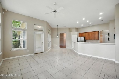 If you enjoy socializing and entertaining, this five-bedroom on Queens Harbour Yacht and Country Club in Florida - for sale on GolfHomes.com, golf home, golf lot