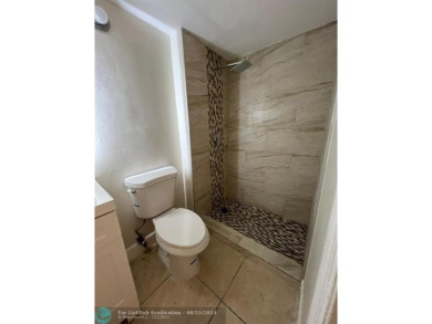 Spacious 2 bed, 2 bath condo with a private balcony and golf on Inverrary Country Club in Florida - for sale on GolfHomes.com, golf home, golf lot