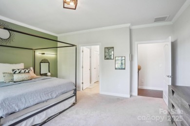 Experience lakefront living in this stunning 4-bedroom, 3.5-bath on The Palisades Country Club in North Carolina - for sale on GolfHomes.com, golf home, golf lot