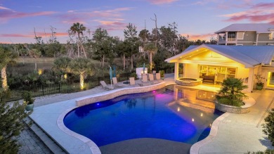 Discover this stunning custom residence in the exclusive, gated on Charleston National Golf Club in South Carolina - for sale on GolfHomes.com, golf home, golf lot