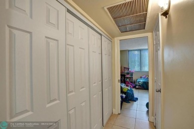 Spacious 2 bed, 2 bath condo with a private balcony and golf on Inverrary Country Club in Florida - for sale on GolfHomes.com, golf home, golf lot