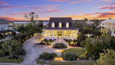 Discover this stunning custom residence in the exclusive, gated on Charleston National Golf Club in South Carolina - for sale on GolfHomes.com, golf home, golf lot