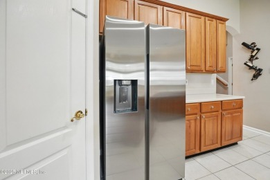 If you enjoy socializing and entertaining, this five-bedroom on Queens Harbour Yacht and Country Club in Florida - for sale on GolfHomes.com, golf home, golf lot