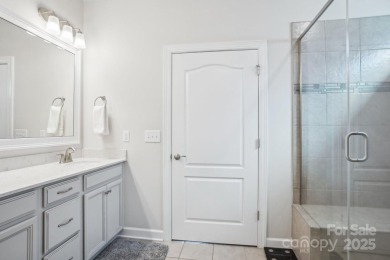 Experience lakefront living in this stunning 4-bedroom, 3.5-bath on The Palisades Country Club in North Carolina - for sale on GolfHomes.com, golf home, golf lot