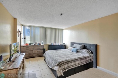 Spacious 2 bed, 2 bath condo with a private balcony and golf on Inverrary Country Club in Florida - for sale on GolfHomes.com, golf home, golf lot