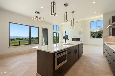 Situated amongst the serene grandeur of Granby Ranch, this on Headwaters Golf Course At Granby Ranch in Colorado - for sale on GolfHomes.com, golf home, golf lot