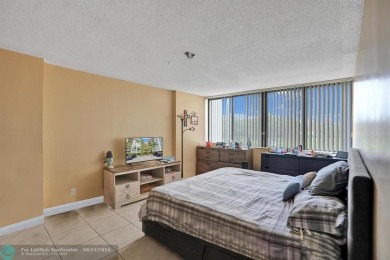 Spacious 2 bed, 2 bath condo with a private balcony and golf on Inverrary Country Club in Florida - for sale on GolfHomes.com, golf home, golf lot