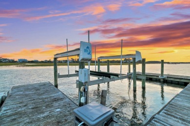 Discover this stunning custom residence in the exclusive, gated on Charleston National Golf Club in South Carolina - for sale on GolfHomes.com, golf home, golf lot