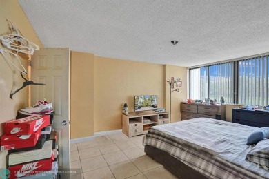 Spacious 2 bed, 2 bath condo with a private balcony and golf on Inverrary Country Club in Florida - for sale on GolfHomes.com, golf home, golf lot