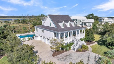 Discover this stunning custom residence in the exclusive, gated on Charleston National Golf Club in South Carolina - for sale on GolfHomes.com, golf home, golf lot