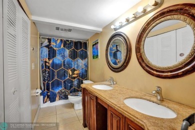 Spacious 2 bed, 2 bath condo with a private balcony and golf on Inverrary Country Club in Florida - for sale on GolfHomes.com, golf home, golf lot