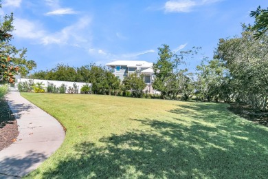 Discover this stunning custom residence in the exclusive, gated on Charleston National Golf Club in South Carolina - for sale on GolfHomes.com, golf home, golf lot