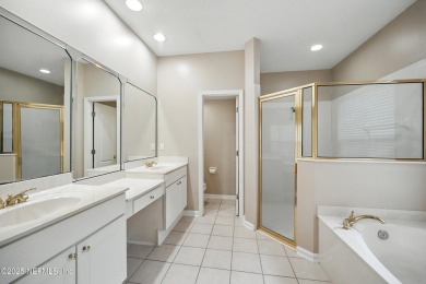 If you enjoy socializing and entertaining, this five-bedroom on Queens Harbour Yacht and Country Club in Florida - for sale on GolfHomes.com, golf home, golf lot
