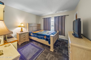 Resort community living is waiting for you.  This 2bd/2ba condo on Harbour Point Golf Club in North Carolina - for sale on GolfHomes.com, golf home, golf lot