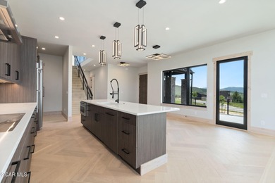 Situated amongst the serene grandeur of Granby Ranch, this on Headwaters Golf Course At Granby Ranch in Colorado - for sale on GolfHomes.com, golf home, golf lot