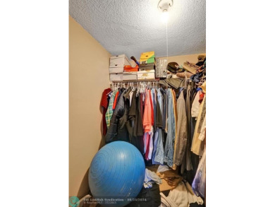Spacious 2 bed, 2 bath condo with a private balcony and golf on Inverrary Country Club in Florida - for sale on GolfHomes.com, golf home, golf lot