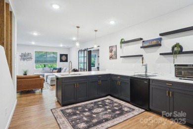 Experience lakefront living in this stunning 4-bedroom, 3.5-bath on The Palisades Country Club in North Carolina - for sale on GolfHomes.com, golf home, golf lot