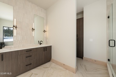 Situated amongst the serene grandeur of Granby Ranch, this on Headwaters Golf Course At Granby Ranch in Colorado - for sale on GolfHomes.com, golf home, golf lot