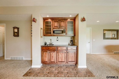 RARE Stone Creek Villa w/ expansive covered deck backing to golf on Stone Creek Golf Course - Sandstone in Nebraska - for sale on GolfHomes.com, golf home, golf lot