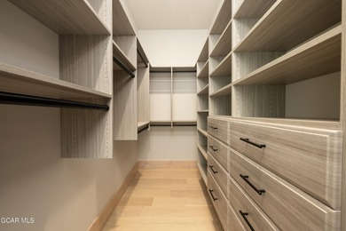 Situated amongst the serene grandeur of Granby Ranch, this on Headwaters Golf Course At Granby Ranch in Colorado - for sale on GolfHomes.com, golf home, golf lot