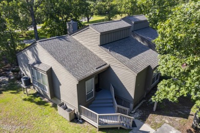 Resort community living is waiting for you.  This 2bd/2ba condo on Harbour Point Golf Club in North Carolina - for sale on GolfHomes.com, golf home, golf lot