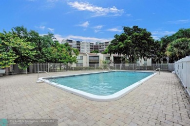 Spacious 2 bed, 2 bath condo with a private balcony and golf on Inverrary Country Club in Florida - for sale on GolfHomes.com, golf home, golf lot