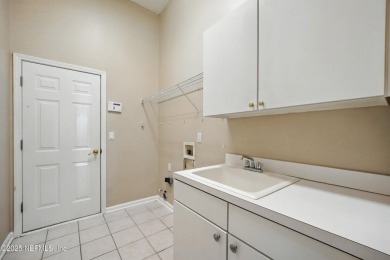 If you enjoy socializing and entertaining, this five-bedroom on Queens Harbour Yacht and Country Club in Florida - for sale on GolfHomes.com, golf home, golf lot