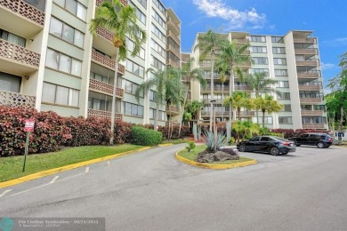 Spacious 2 bed, 2 bath condo with a private balcony and golf on Inverrary Country Club in Florida - for sale on GolfHomes.com, golf home, golf lot