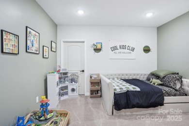 Experience lakefront living in this stunning 4-bedroom, 3.5-bath on The Palisades Country Club in North Carolina - for sale on GolfHomes.com, golf home, golf lot