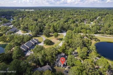 Resort community living is waiting for you.  This 2bd/2ba condo on Harbour Point Golf Club in North Carolina - for sale on GolfHomes.com, golf home, golf lot