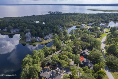 Resort community living is waiting for you.  This 2bd/2ba condo on Harbour Point Golf Club in North Carolina - for sale on GolfHomes.com, golf home, golf lot