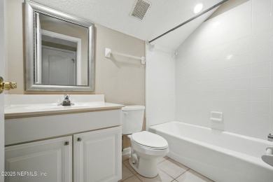 If you enjoy socializing and entertaining, this five-bedroom on Queens Harbour Yacht and Country Club in Florida - for sale on GolfHomes.com, golf home, golf lot