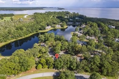 Resort community living is waiting for you.  This 2bd/2ba condo on Harbour Point Golf Club in North Carolina - for sale on GolfHomes.com, golf home, golf lot